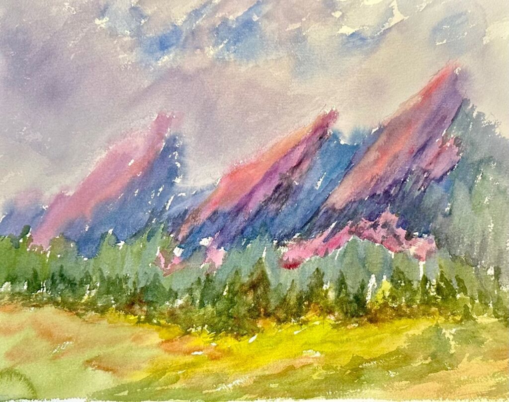 Mist in the Flatirons, original watercolor painting of three pinkish peaks with trees and grass in the valley below