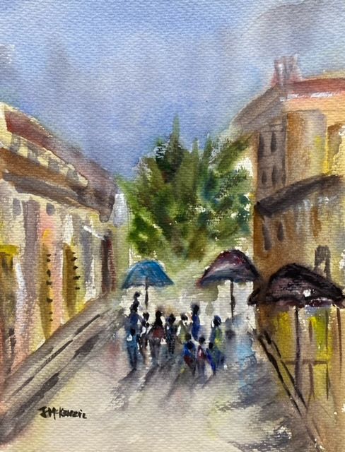 San Cristobal, original watercolor painting of a street with people walking with unbrellas and buildings on each side