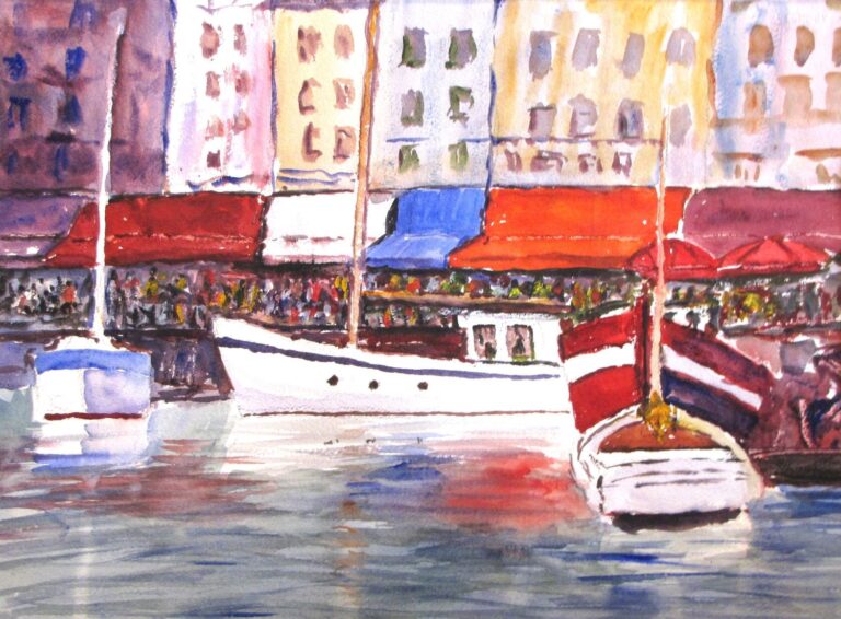 Honfleur Harbor, original watercolor painting of a harbor with sailboats in the harbor. There are tall buildings across the harbor with red umbrellas and awnings of red, blue, and white with lots of people underneath.